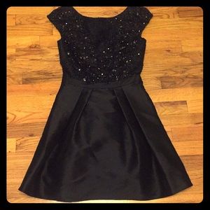 Cocktail dress with beaded bodice.